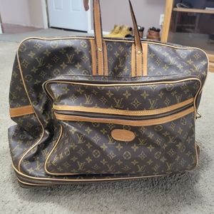 Vintage expandable Louos Vuitton Wheeled duffle bag